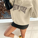Ezwear sudadera holgada con capucha de felpa gruesa con estampado minimalista casual de leopardo y estrella en blanco para mujeres