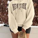 Ezwear sudadera holgada con capucha de felpa gruesa con estampado minimalista casual de leopardo y estrella en blanco para mujeres