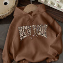 Ezwear sudadera holgada con capucha de felpa gruesa con estampado minimalista casual de leopardo y estrella en blanco para mujeres