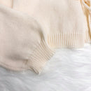 Cardigan de punto de color liso con detalle de nudo delantero, de estilo minimalista para uso en la oficina, atemporal y femenino. cardigan de punto en un solo color con abertura frontal que se puede usar sobre blusas, un cardigan oversize y adorable