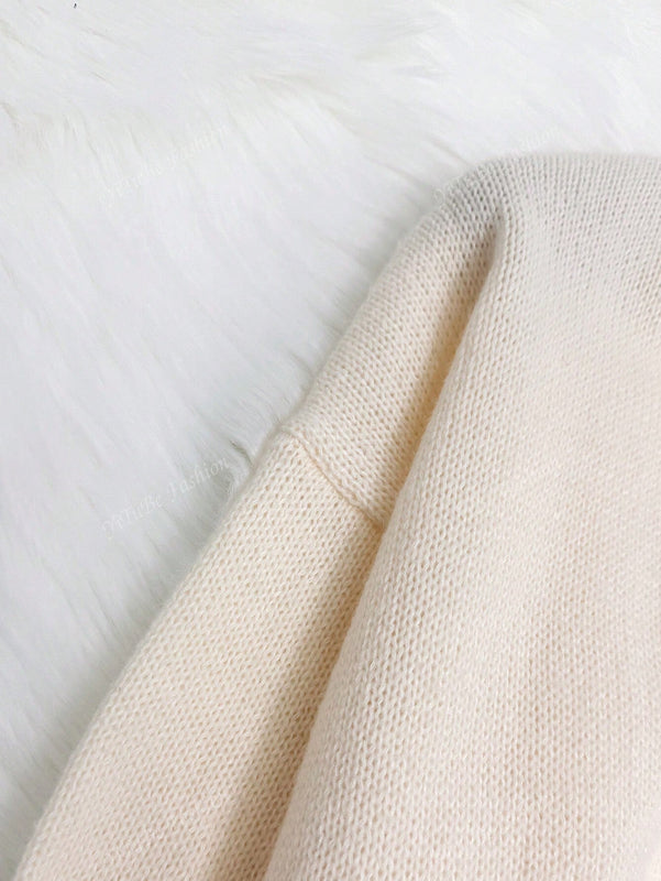 Cardigan de punto de color liso con detalle de nudo delantero, de estilo minimalista para uso en la oficina, atemporal y femenino. cardigan de punto en un solo color con abertura frontal que se puede usar sobre blusas, un cardigan oversize y adorable