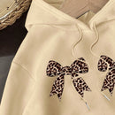 Attitoon sudadera holgada de manga larga con capucha, estampado de estilo minimalista de leopardo, para mujer, de otono/invierno