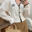 Dazy camisa casual de manga larga con bloques de color, decoracion de lazo e impresion de botones para mujer