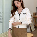 Dazy camisa casual de manga larga con bloques de color, decoracion de lazo e impresion de botones para mujer