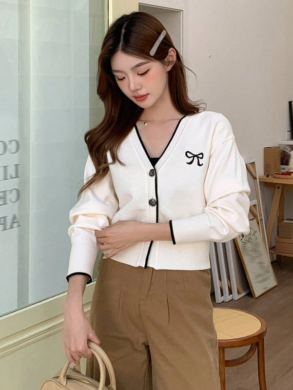 Dazy camisa casual de manga larga con bloques de color, decoracion de lazo e impresion de botones para mujer