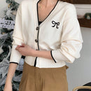 Dazy camisa casual de manga larga con bloques de color, decoracion de lazo e impresion de botones para mujer