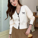 Dazy camisa casual de manga larga con bloques de color, decoracion de lazo e impresion de botones para mujer