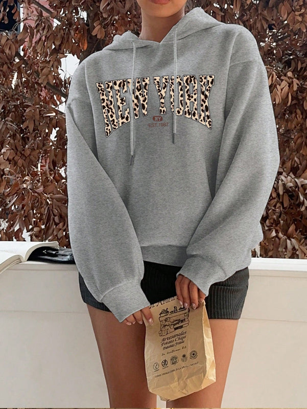 Ezwear sudadera holgada con capucha de felpa gruesa con estampado minimalista casual de leopardo y estrella en blanco para mujeres