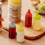 4 botellas mini portátiles para salsas - Duraderas, a prueba de fugas y fáciles de exprimir, ideales para loncheras, picnics y aventuras al aire libre