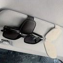 Soporte para gafas de visera de coche, gancho para gafas de cuero sintético, clip para tarjeta de boleto, ajuste firme automático, instalación fácil, accesorio de interior de coche elegante, regalo ideal para vacaciones.