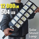 1 lámpara de calle solar, 504×6500K LEDs con lente. Luz automática de puesta de sol a amanecer alimentada por energía solar para estacionamientos; sensor de movimiento de ángulo amplio y farola controlada a distancia. Ideal para iluminación comercial/cor