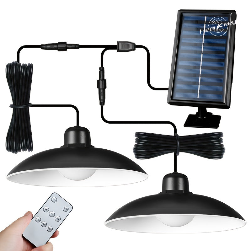 2 luces colgantes solares HeeyKeey con control remoto, 3 modos de iluminación y brillo ajustable, 2 focos LED con haz de 30°, cúpula negra de ABS para interior/exterior, patio, gazebo, cochera, sala, luces solares colgantes para exteriores, iluminación p
