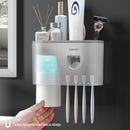 Un conjunto de soportes para cepillos de dientes con 4 ranuras para cepillos de dientes y un dispensador automático de cepillos de dientes con una taza magnética, un contenedor multifuncional para cepillos de dientes y un conjunto de accesorios para baño.