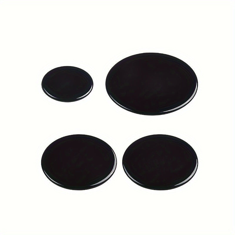 Conjunto de 4 accesorios compatibles para estufas de gas empotradas SABAF, que incluye cubiertas para los quemadores en tamaños: 1 pieza de 55 mm, 2 piezas de 75 mm y 1 pieza de 100 mm.