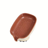 El recipiente de jabón cuenta con agujeros de drenaje y un diseño de succión para uso en el hogar, evitando la acumulación de agua. Es una adición minimalista y creativamente lujosa para baños.