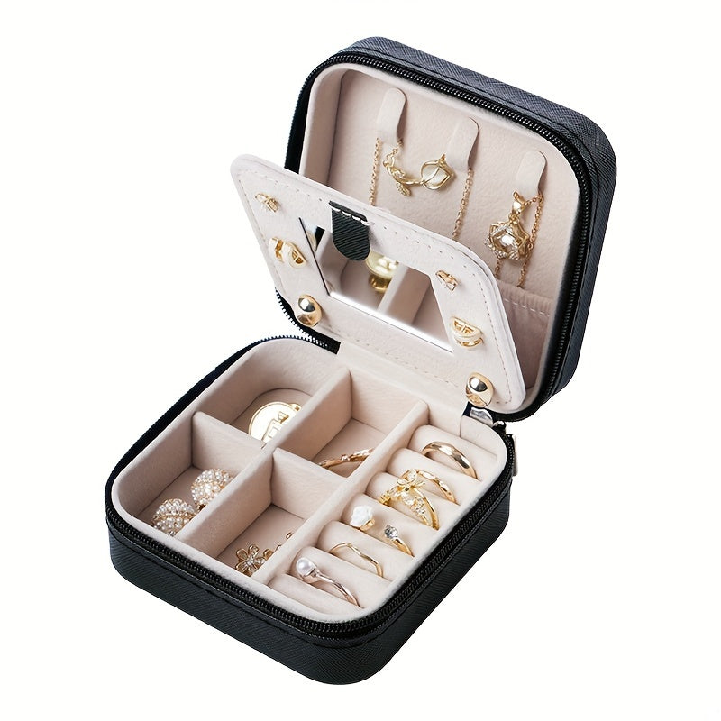 Un elegante y creativo joyero portátil para anillos y pendientes, con una cremallera y una tapa abatible para facilitar su transporte. Este estuche de viaje incluye un espejo y está diseñado para collares, pendientes y anillos, joyeros.