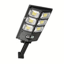 1 lámpara de calle solar, 504×6500K LEDs con lente. Luz automática de puesta de sol a amanecer alimentada por energía solar para estacionamientos; sensor de movimiento de ángulo amplio y farola controlada a distancia. Ideal para iluminación comercial/cor