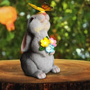 Una estatua de conejo decorativa para exteriores con luces de mariposa solares, perfecta para decoración de jardín, adecuada para patios, balcones y jardines - un regalo de bienvenida a casa único.