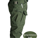 Pantalones Tácticos para Hombre - Múltiples Bolsillos de Utilidad (Correa en la Pierna/Bolsillos Laterales), Tejido Suave y Elástico, Diseño Sin Cinturón para Exteriores, Senderismo, Camping, Trabajo - Pantalones Todo en Uno, Equipo Táctico de Campamento
