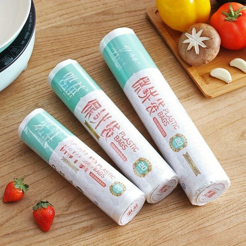 Un rollo de aproximadamente 200 bolsas con cierre a presión para almacenamiento de alimentos; ideales para contacto alimentario, transporte temporal y almacenamiento esencial en la cocina