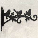 2 piezas de colgadores de plantas de metal negro con diseño de 3 pájaros y hojas - Ganchos de montaje en pared de alta resistencia para canastas de flores al aire libre, luces solares, comederos de pájaros - Instalación fácil, no se necesita batería, col
