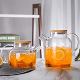 Tetera de vidrio borosilicato con tapa de bambú, 1000ml/1800ml, resistente al calor, jarra de agua de vidrio transparente, pico con filtro removible, apta para estufa y microondas, ideal para té de hojas sueltas y jugo de frutas, regalo perfecto para día