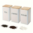 Juego de 3 contenedores de almacenamiento de metal elegantes con tapas de bambú - Perfectos para té, café y azúcar, con un diseño apilable, ideal para la organización y almacenamiento de la cocina.
