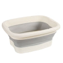 Baño de pies plegable de alta venta mejorada, diseño portátil que ahorra espacio con asa para uso doméstico, bañera de pies de plástico de alta densidad con bolas de masaje en la parte inferior, ideal para lavar los pies.