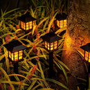 Conjunto de 6 Luces Solares con Efecto Llama LED para Caminos - Iluminación Decorativa para Jardín y Césped Exterior, Efecto de Llama Amarilla Cálida, Soportes Metálicos Negros con Acentos de Cristal, Perfectas para Navidad, Patios y Paisajismo, Luz Ambi