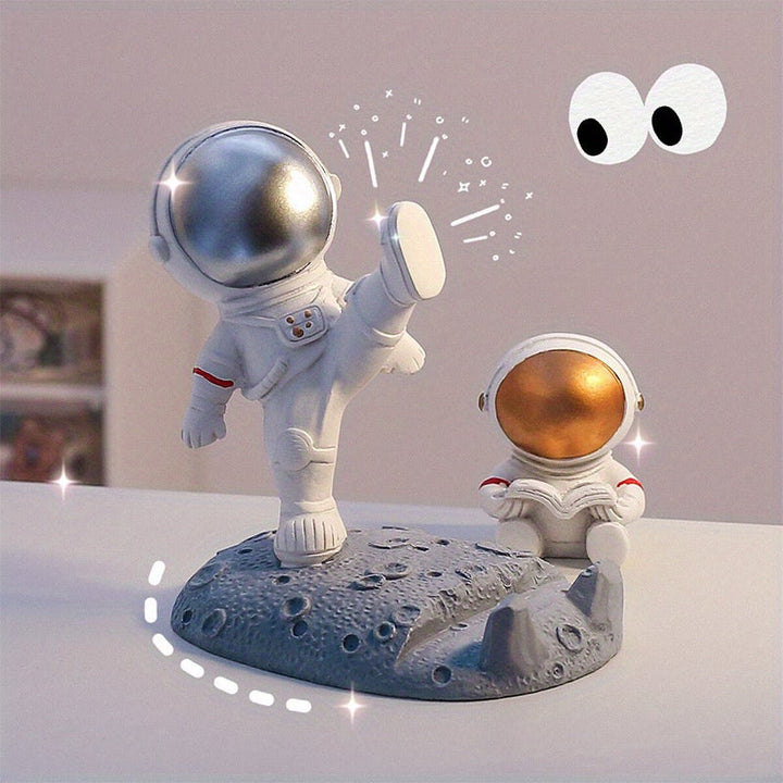 Nuevo soporte para teléfono móvil de astronauta popular, plástico, astronauta de mano, regalo creativo de oficina, soporte de decoración de mesa.