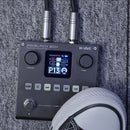 Modelador de efectos portátil para guitarra/bajo con 6 módulos de efectos, 80 presets editables y batería recargable