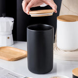 Frascos de almacenamiento de alimentos de cerámica multiusos con cierre de pestillo, recipientes redondos reutilizables para la organización de la cocina, se recomienda lavar a mano - Juego de 1 contenedor negro para té, café, dulces, granos