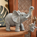 Encantadora Figura de Elefante en Resina con Columpio y Cuna – Diseño Gris Detallado para Decoración Interior/Exterior, Ideal para Sala, Estantería, Vitrina o Soporte de Televisión, Adorno de Elefante