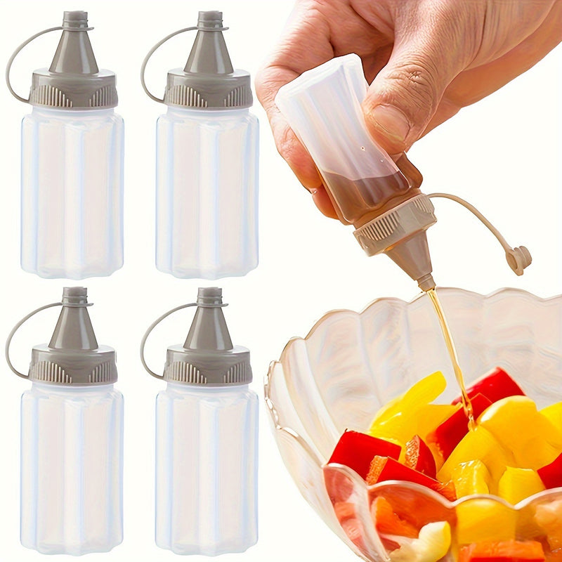 Juego de 4 Botellas Mini para Condimentos con Tapas - Tarros de Especias Portátiles para Cocina, Camping, Picnics, Escuela y Oficina - Plástico Libre de PVC, Forma Ovalada, Almacenamiento de Condimentos