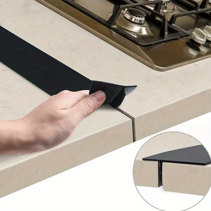 Rejilla de Sellado Integrada para Huecos de Estufa - Cubierta de Borde de Encimera de Alta Calidad para Relleno y Protección contra Salpicaduras, Tira Adhesiva Negra Duradera para Instalación de Estufas, Fácil Montaje en Electrodomésticos de Cocina