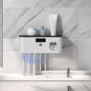 Portacepillos inteligente con luz UV, organizador de baño sin taladro, carga USB, 4 compartimentos coloridos, diseño blanco moderno para cepillos de dientes e hilo dental, instalación sin perforaciones, estética contemporánea