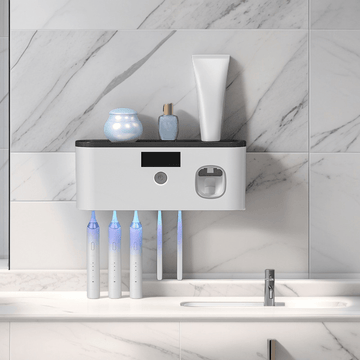Portacepillos inteligente con luz UV, organizador de baño sin taladro, carga USB, 4 compartimentos coloridos, diseño blanco moderno para cepillos de dientes e hilo dental, instalación sin perforaciones, estética contemporánea