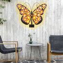 Una lámpara de pared con forma de mariposa, una luz decorativa con silueta de mariposa de arte de hierro con energía solar, adecuada para jardines al aire libre, patios y decoraciones festivas de primavera en paredes exteriores.