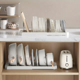 Soporte de Ollas Retráctil de Acero Inoxidable con 6 Compartimentos Ajustables - Estante Flexible para Cocina para Ollas, Tapas y Utensilios - Ideal para Cocinas Caseras, Cafeterías, Restaurantes y Bares