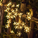 Lámpara solar decorativa para exteriores con luces de cerezo, 1 cuerda, material plástico, temática floral, regulable, control con botón, 8 modos de iluminación, panel solar en marco metálico, iluminación para jardín | Luz elegante | Duradera, luces sola
