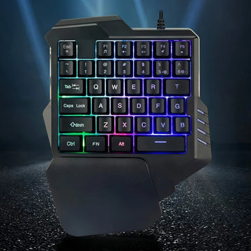 Teclado Gamer Usb Una Mano Retroiluminado 8 Colores Color del teclado Negro