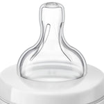 Tetero Avent Anti Cólicos 9oz 1m+ (Flujo 2) Decorado Jirafa sin BPA, Clinicamente Probado, modelo SCF821/12