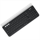 Teclado Logitech QWERTY español España color negro y blanco