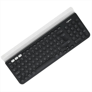 Teclado Logitech QWERTY español España color negro y blanco
