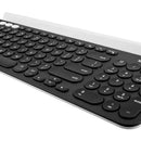 Teclado bluetooth Logitech QWERTY español latinoamérica color negro y blanco