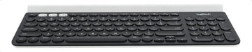 Teclado bluetooth Logitech QWERTY español latinoamérica color negro y blanco
