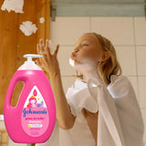 Shampoo Johnson's shampoo infantil Gotas de Brillo de aceite de argán en dosificador de 1000L por 1 unidad