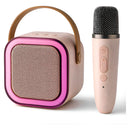 Mini Parlante Karaoke K12 Audiok Con Efectos De Luz Y Efectos De Voz Color Rosa