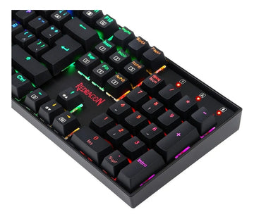Teclado gamer Redragon Mitra QWERTY Outemu Blue español latinoamérica color negro con luz RGB