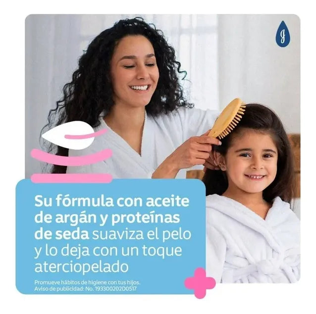 Shampoo Johnson's shampoo infantil Gotas de Brillo de aceite de argán en dosificador de 1000L por 1 unidad